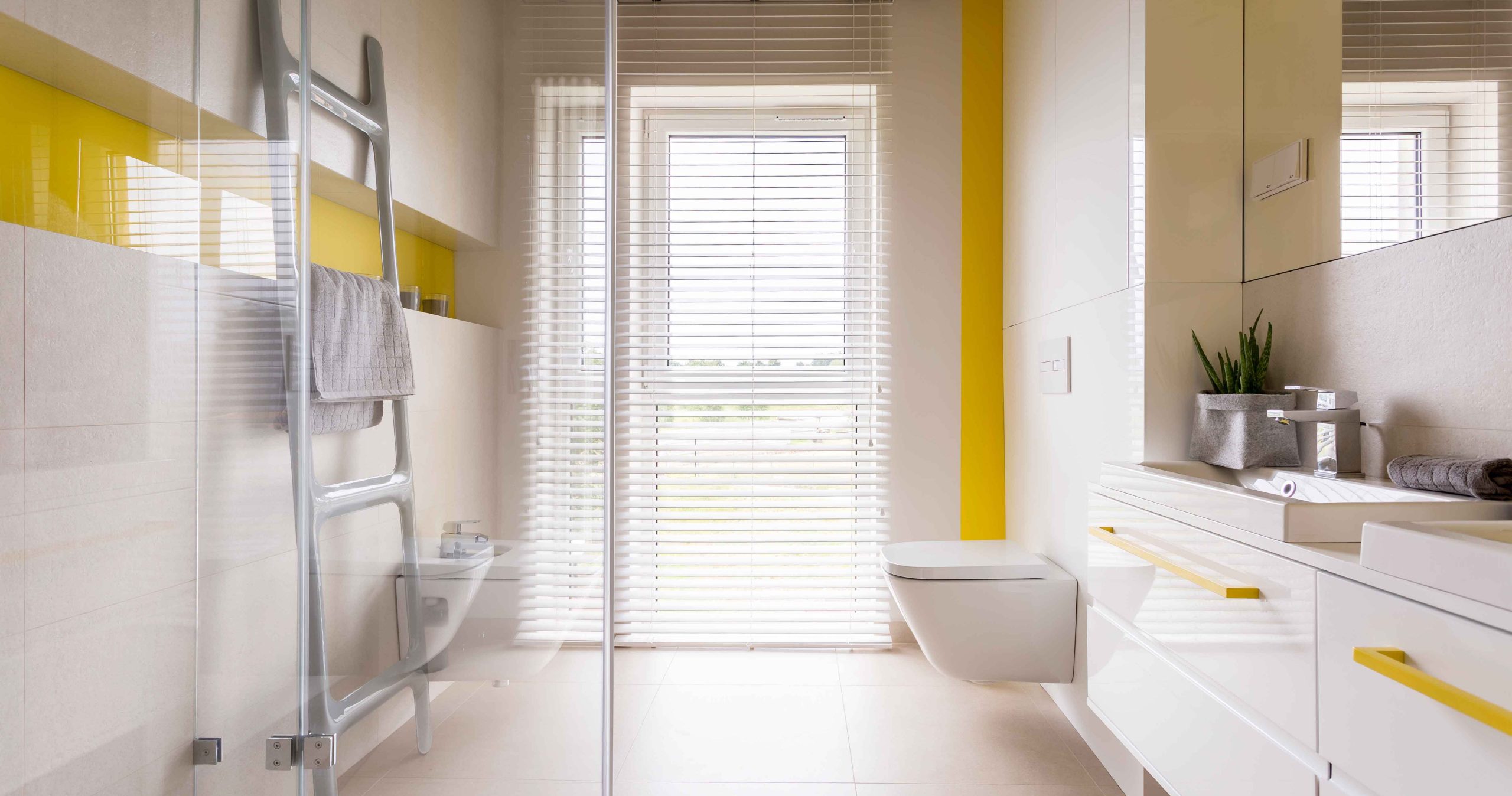 Luxury bathroom with yellow details